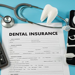 Dental insurance form on a desk in Fort Smith