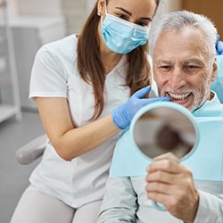 Placement of your crowns is the last step of the four-step dental implant process