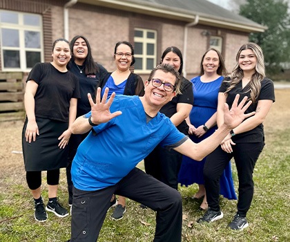 Dental team standing outside of Fort Smith dental office