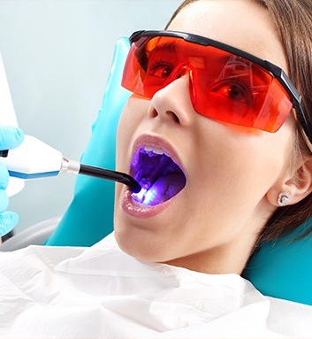 young girl getting in dental chair