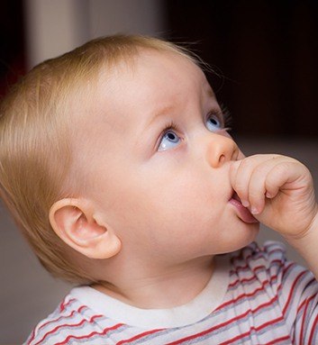 boy sucking thumb