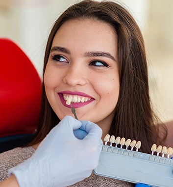 woman getting checked for veneers