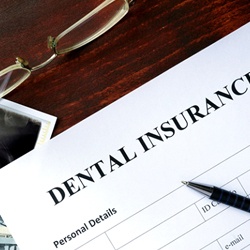 dental insurance form on table