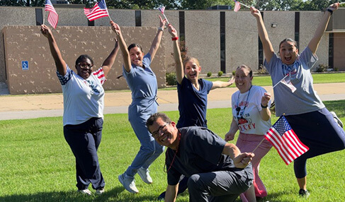 Fort Smith dental team with mascot