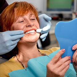 Woman smiling at dentist