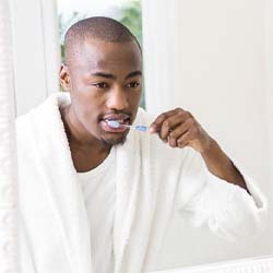 Man brushing teeth