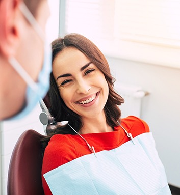 patient smiling at her dentist 