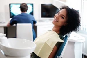 Woman smiling during her visit to a dentist in Fort Smith