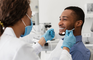 Patient talking to their dentist